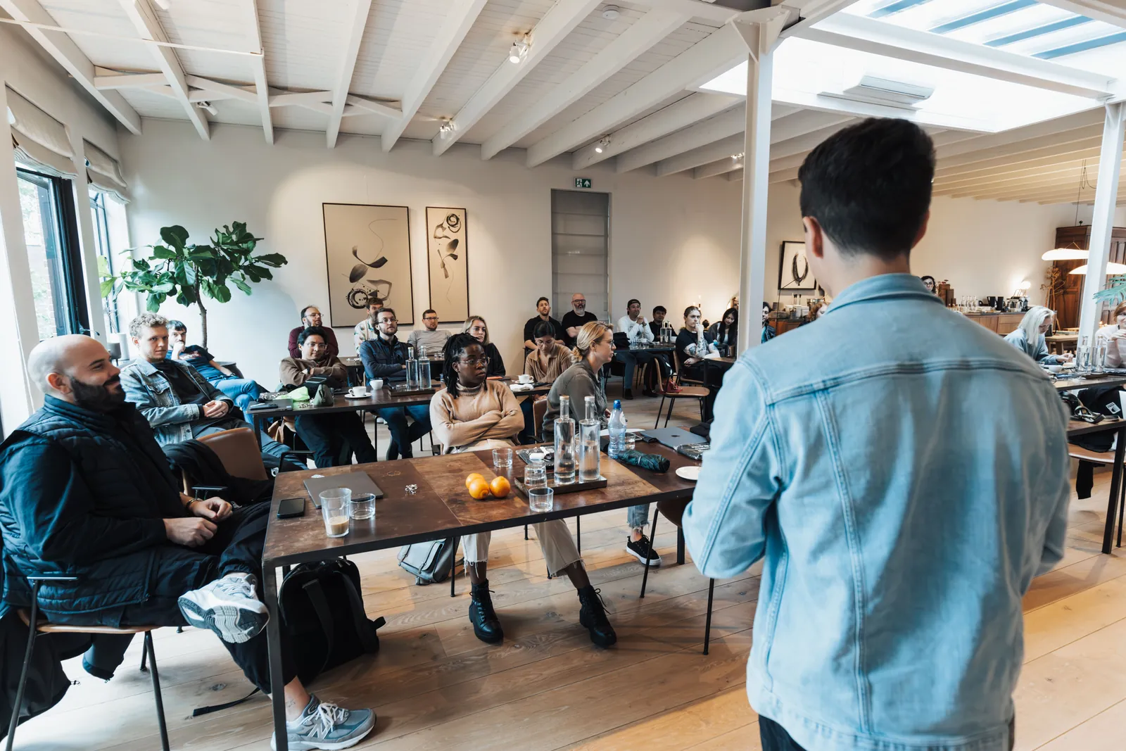 Business professionals collaborating during a presentation in a modern conference room