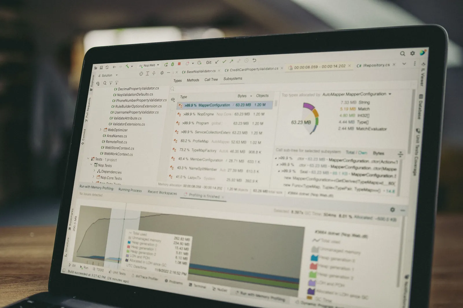 A close-up view of a laptop screen showing a coding and data analysis software interface