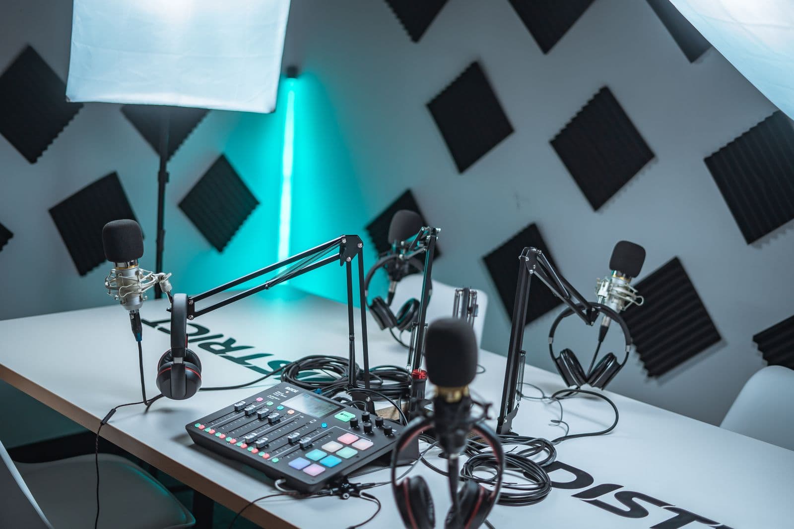 A podcast studio setup with microphone and mixer